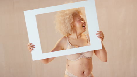 Studio-Shot-Of-Confident-Natural-Woman-In-Underwear-Promoting-Body-Positivity-In-Picture-Frame