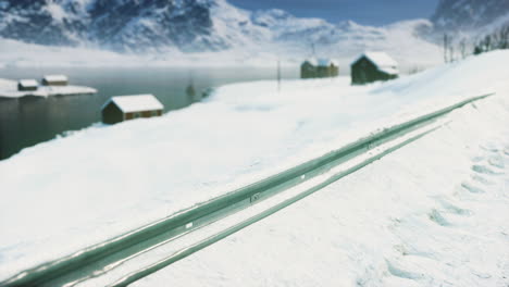 traditional-Norwegian-wooden-houses-under-the-fresh-snow