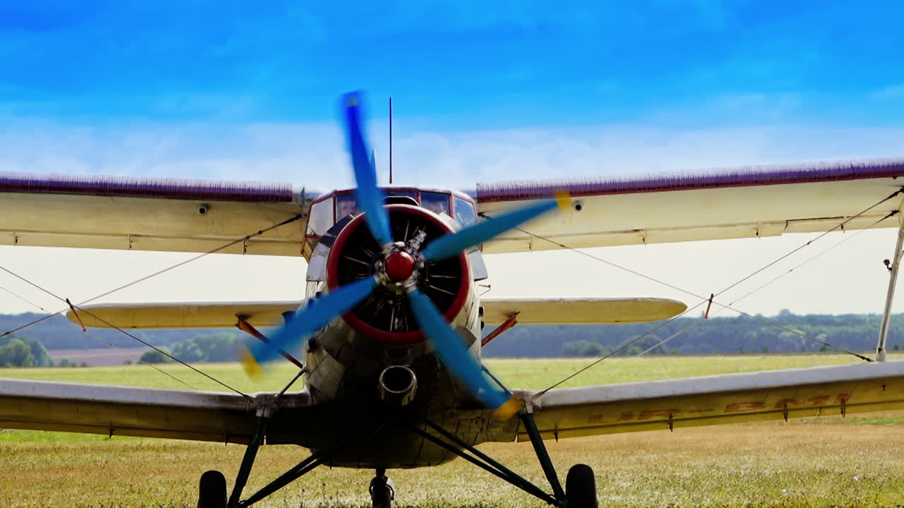 Vintage Biplane on a Field