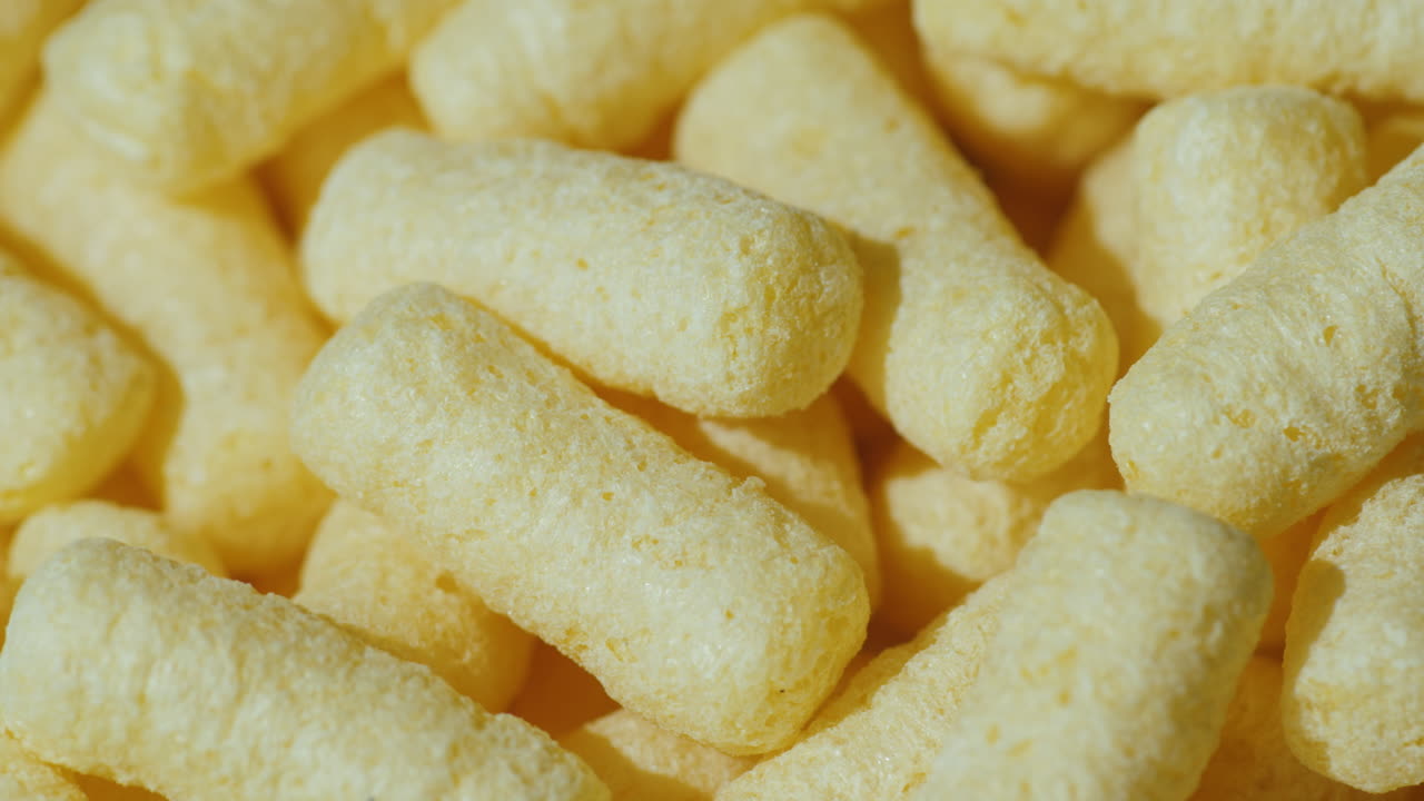 fondo de bocadillos ligeros - palitos de maíz