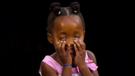 young black girl making silly faces