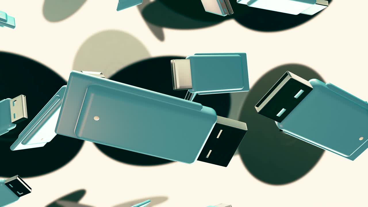 Rotating flash drives and DVD on white