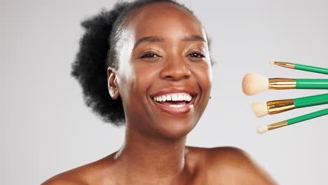 Face,-makeup-and-smile-of-black-woman-with-brushes