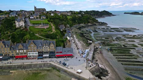 cancale promenade with oyster beds or parks, brittany in france