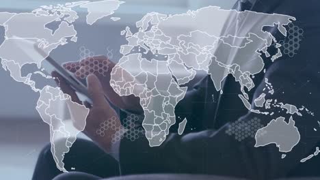 Animation-of-world-map-over-hands-of-caucasian-businessman-using-tablet