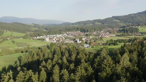 aerial drone view of village town of kotlje surround by nature, slovenia