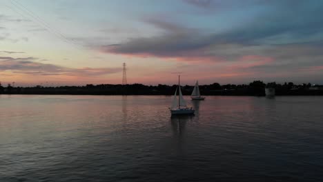 Aerial-tracking-shot-of-a-traditional-sailing-boat-on-the-upper-Columbia-river