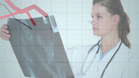 animation of statistical data processing over caucasian female doctor examining x-ray report