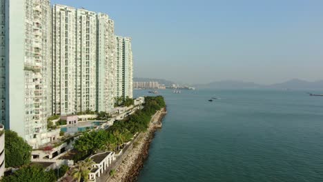 hong kong butterfly beach area skyscrapers and ocean walk, low angle aerial view