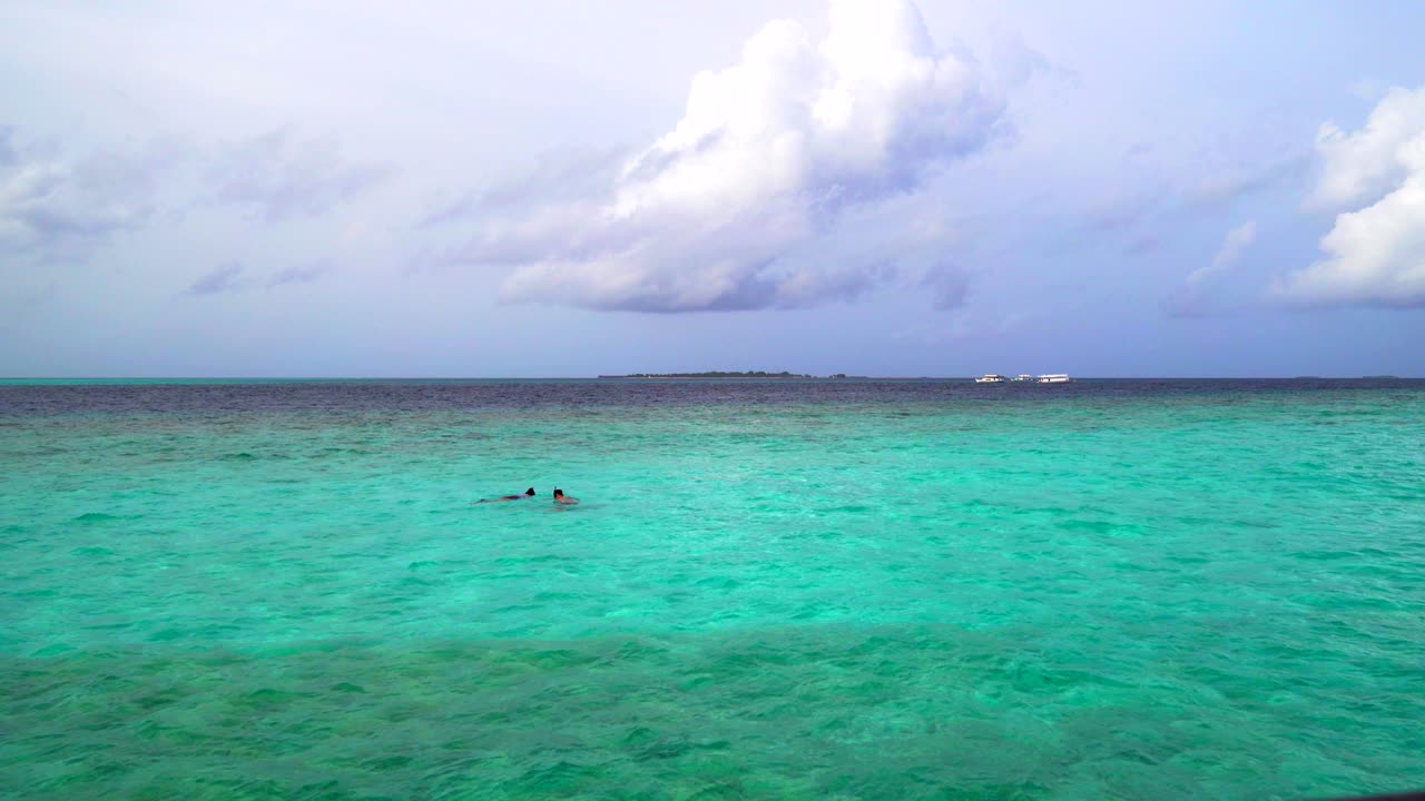 Beautiful tropical Maldives island in the ocean background.
