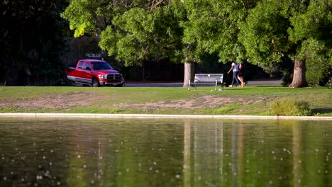 people walking in slow motion in denver city park