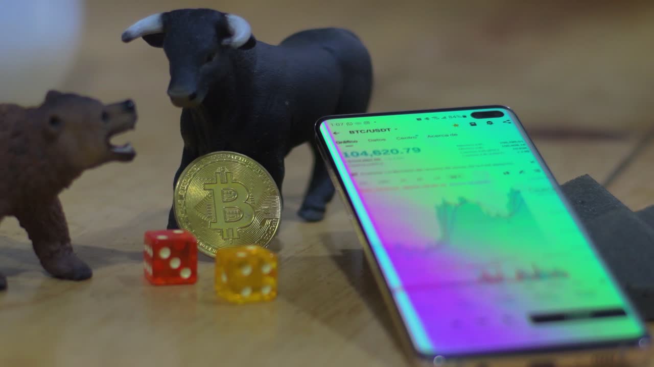 Dynamic representation of financial trends features bull and bear figures alongside a Bitcoin coin and a smartphone displaying market data. Captures the essence of trading in cryptocurrency.