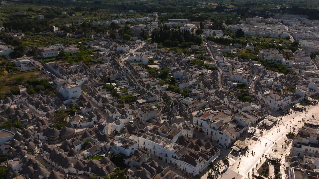 Drone view of Alberobello Trulli rooftops and narrow alleys. Round trullo shepherd huts, Apulia, Italy