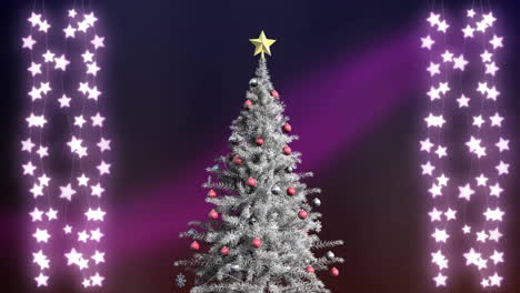 Animation-of-star-fairy-lights-over-christmas-tree-in-winter-scenery-background