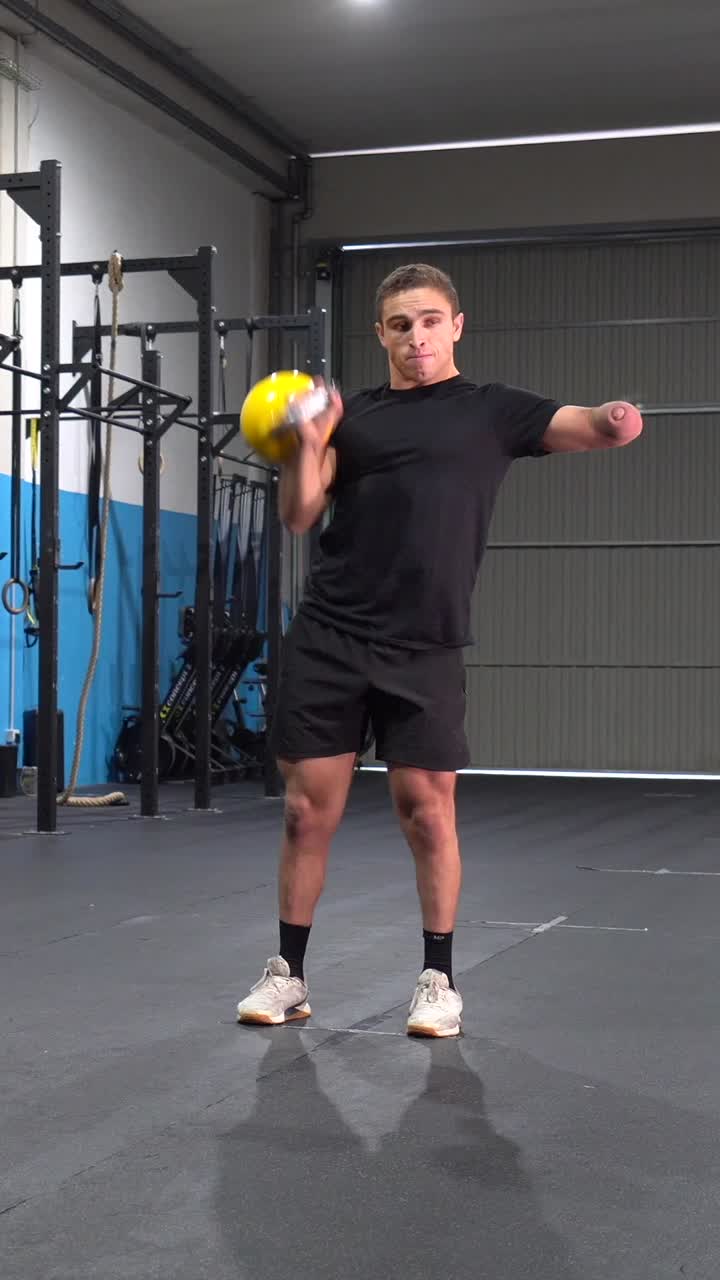 Man working out with kettlebell
