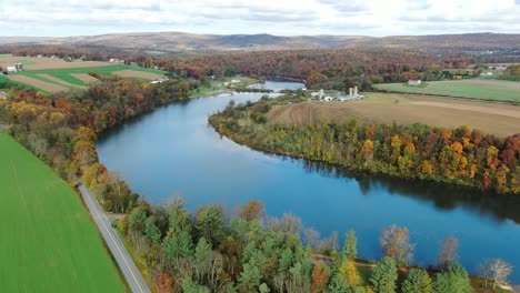 aerial of rolling hills in lancaster county pa, speedwell forge lake surrounded by rural farmland