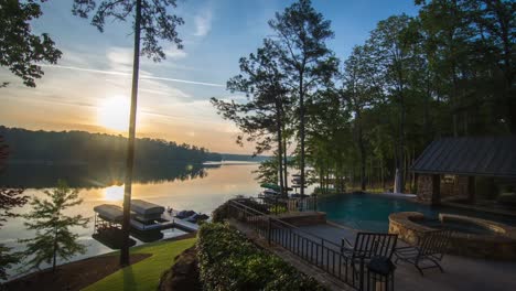 peaceful scenic sunrise on calm waterfront resort pool, relaxing landscape