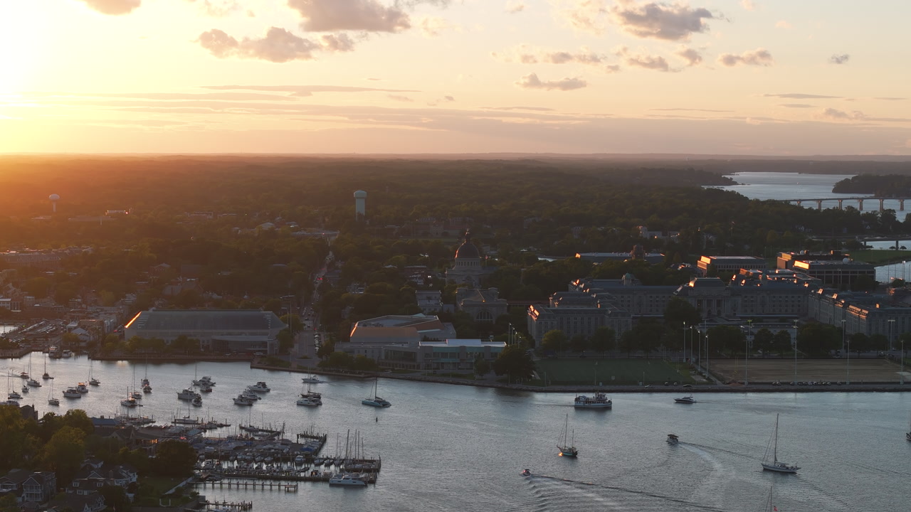Aerial View Of The Annapolis Waterfront During Sunset With The United States Naval Academy Campus In Maryland, USA.