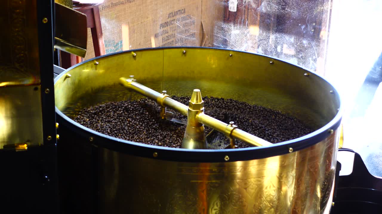 Coffee roasting machine work. Machine operation technology