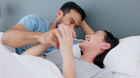 happy, relax and love couple in bed being