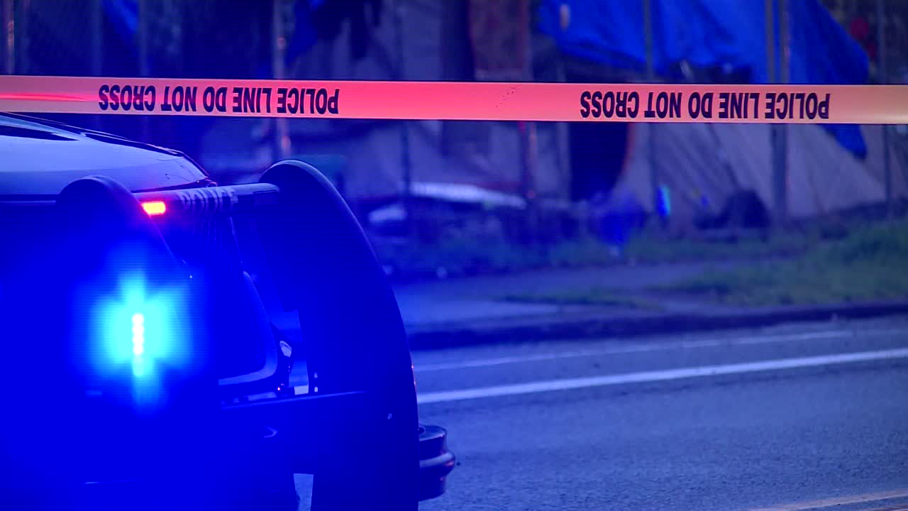POLICE SIREN LIGHTS NEAR POLICE CRIME SCENE TAPE