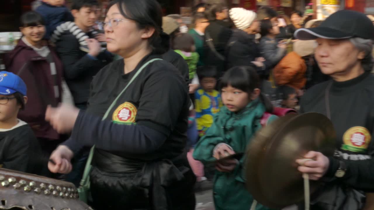 February 24, 2018, Tokyo, Japan - Musicians perform during the Chinese New Year Parade 2018 in Yokohama's Chinatown.