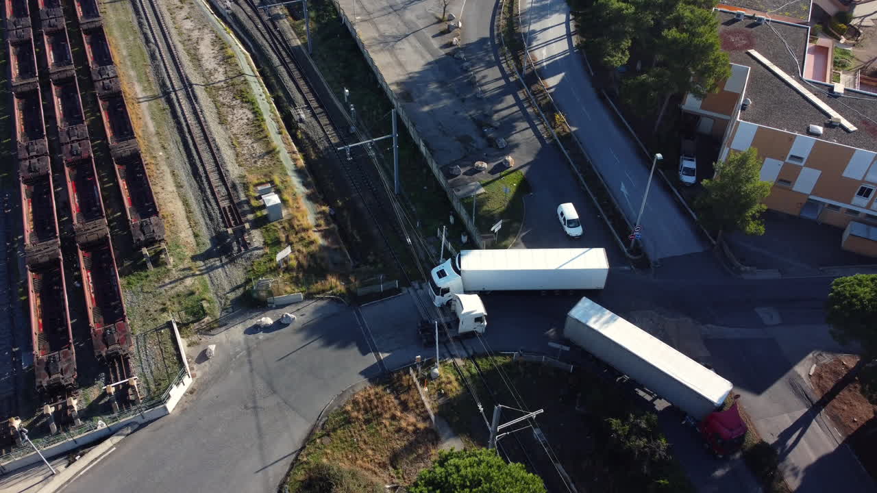 Truck and Train at Railroad Crossing