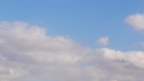 blue sky with fluffy clouds