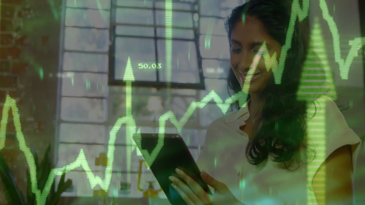 Smiling woman using tablet with stock market data animation overlay