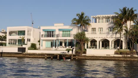 progressive view of a luxurious waterfront mansion