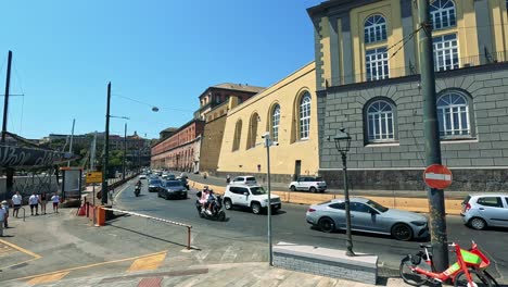 traffic and pedestrians in a bustling urban setting