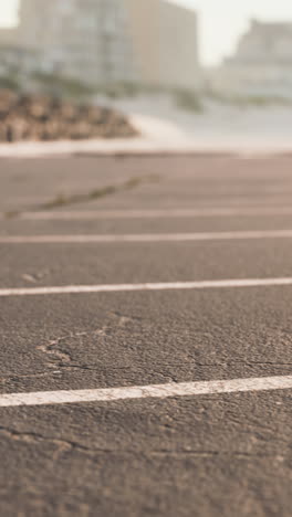 close up of blacktop with white lines