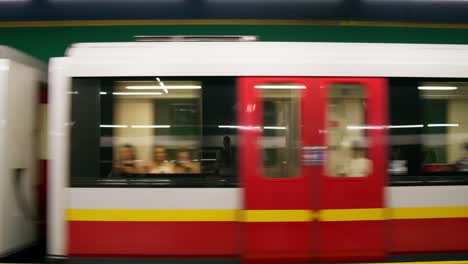 woman walking on subway platform