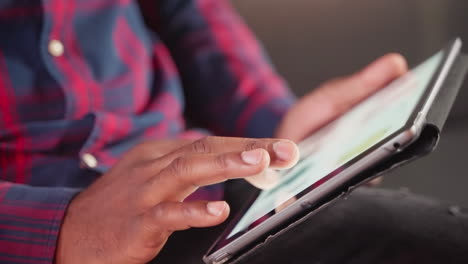 man using a tablet