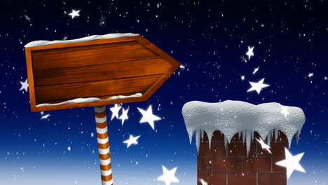 nieve cayendo y cartel de madera