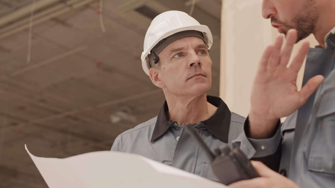 Contractors Emotionally Discussing Project Plan