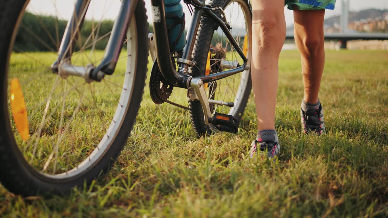 Man ride bicycle near beach in Barcelona, city morning, carbon neutral transportation. Travel, sustainability and cycling with male speed and transit,
