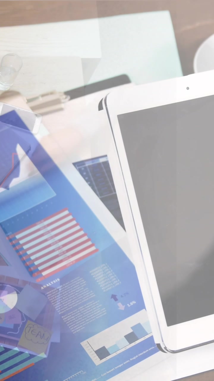 Animation of caucasian businessman using tablet over busy office