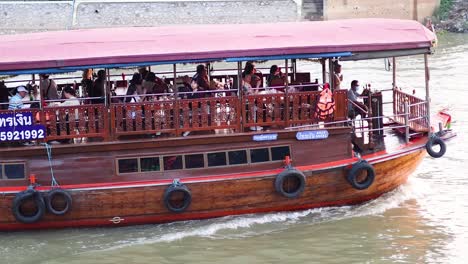 tourists enjoying a boat ride in ayutthaya