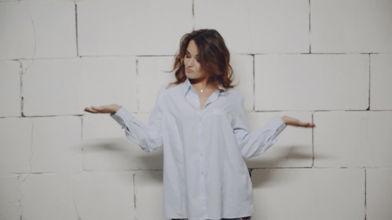 Woman Posing in a Light Blue Shirt