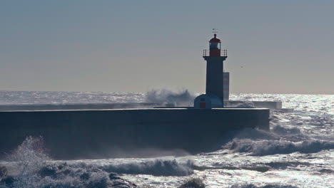 Portugal&#039;s coastal lighthouse apron paving withstands the relentless embrace of crashing waves&mdash;a dynamic spectacle, where nature and architecture converge in a symphony of strength