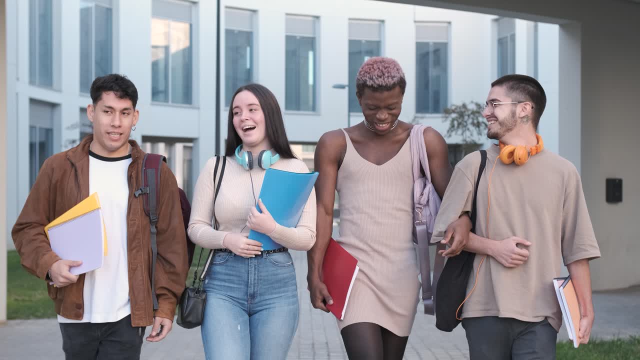 Multiethnic group of students walking together while talking