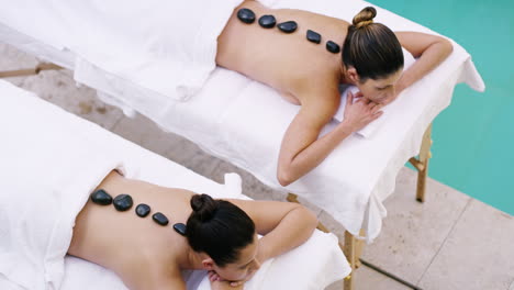 hot stone massage therapy melts away tension