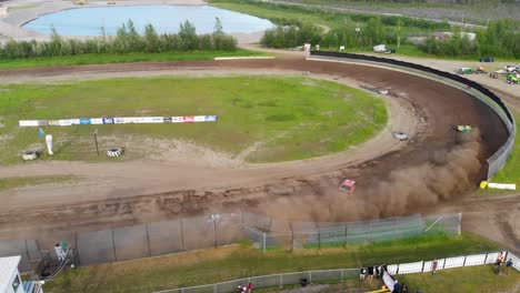 4k drone video of stock car racing at mitchell raceway in fairbanks, ak during sunny summer evening-2