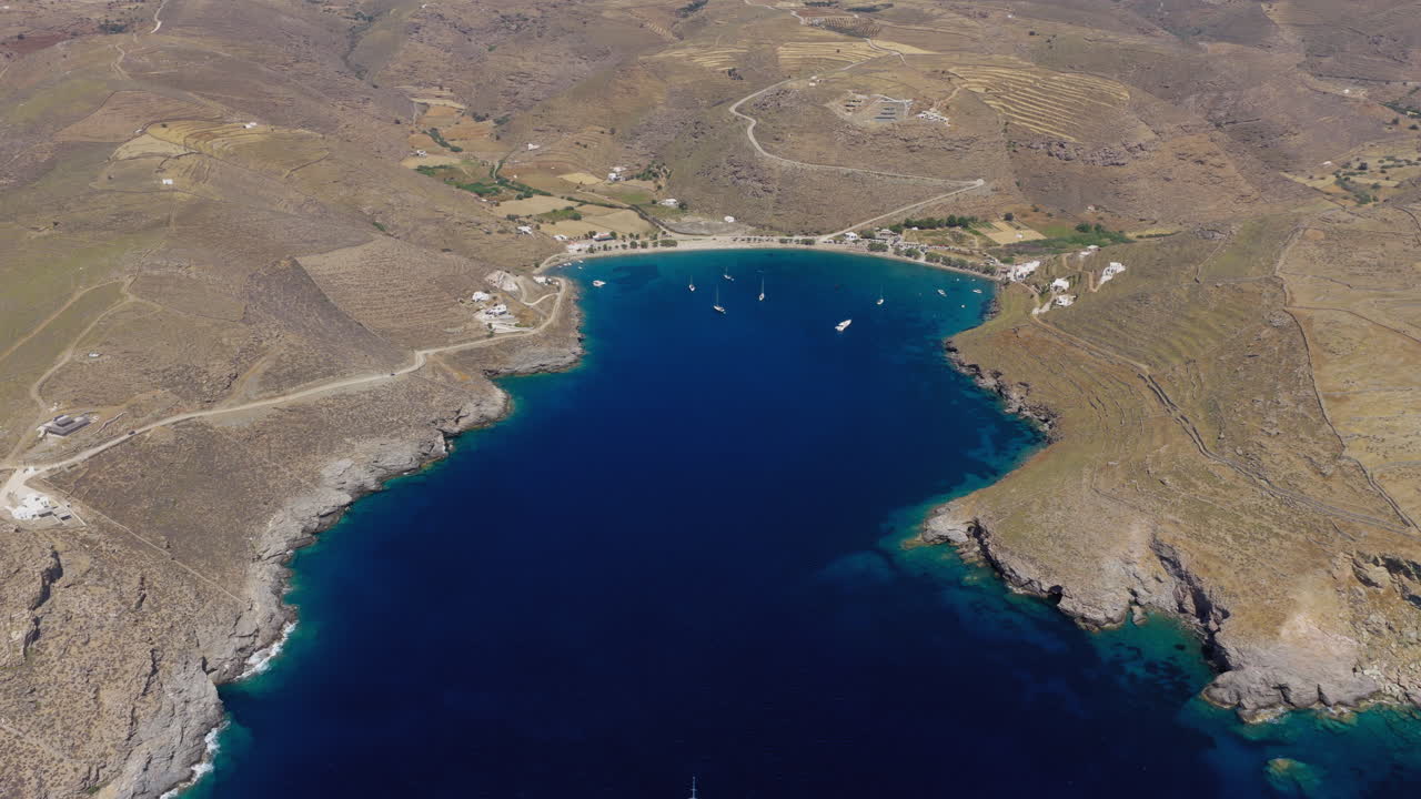 Panoramic drone shot of the long sandy Apokrousi Beach on Kythnos island, Greece