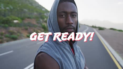 Animation-of-the-words-get-ready-in-white-over-portrait-of-man-exercising-on-mountain-road