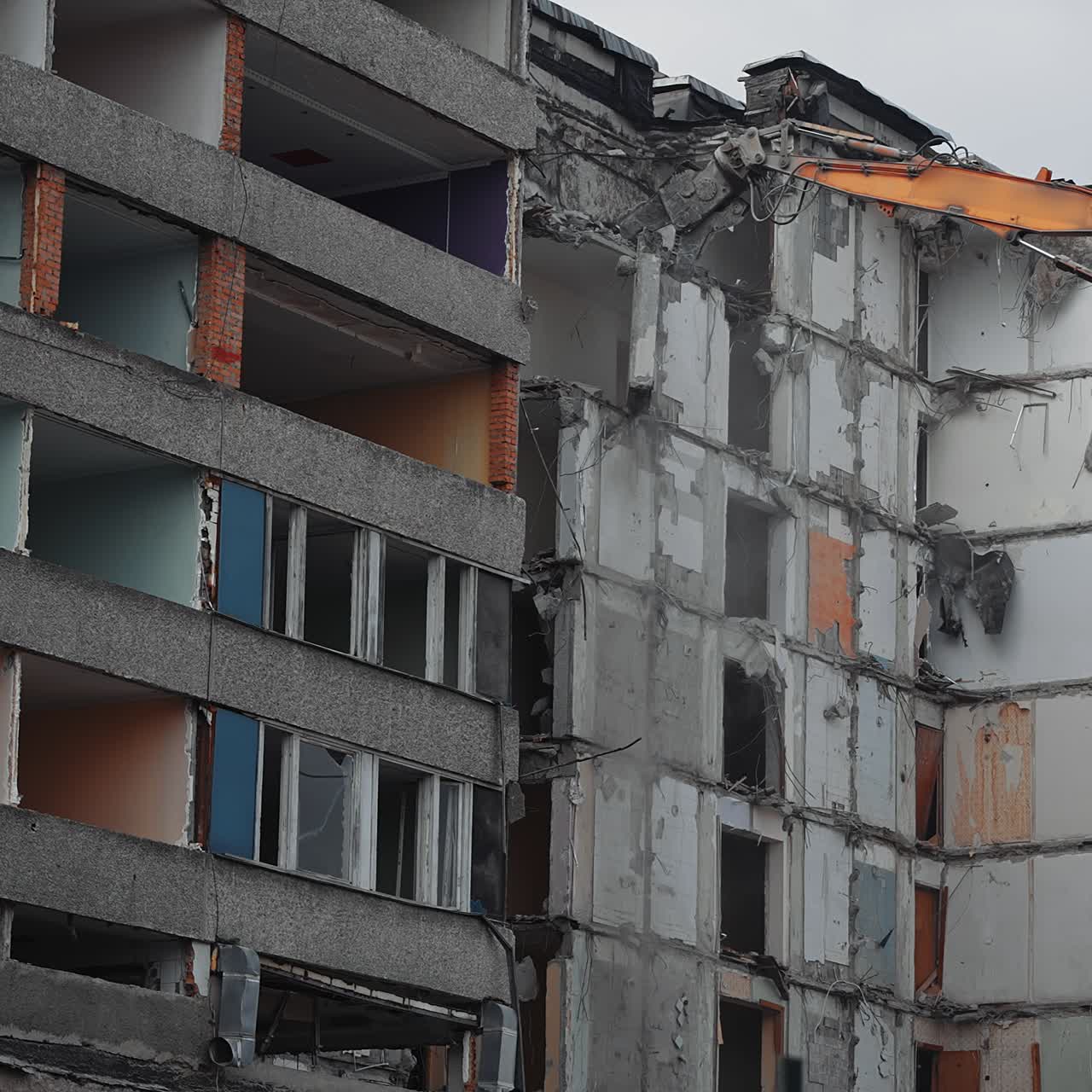 Destruction excavator house demolishing. Demolition building by machine