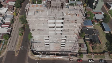 bird's-eye drone footage providing a captivating view of construction progress on buildings from above, ideal for showcasing dynamic urban development