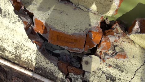 badly broken wall of house