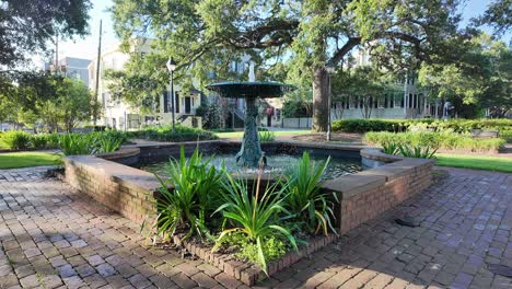 peaceful water fountain in historic town square in savannah, georgia